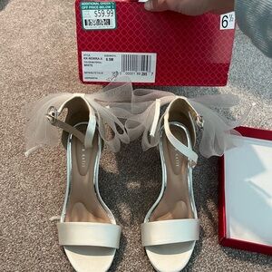6.5 White bow heels kelly and Katie new and never worn!